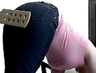 Severe paddlings for a teenage girl in tight blue jeans